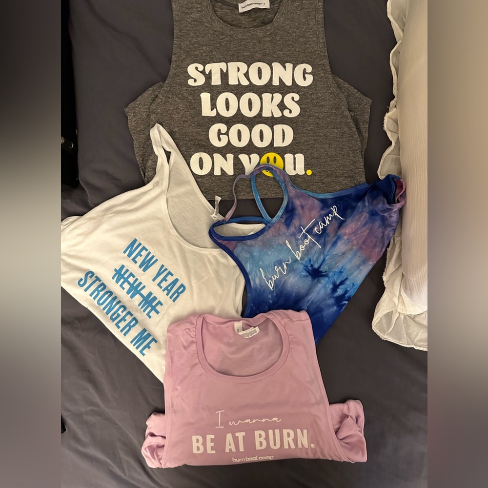 Lot of four gently used Burn Boot Camp Tank Tops size small